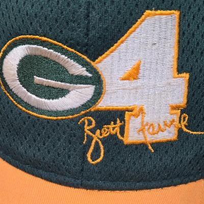 LOT 105X: Numbered Spectrum 24k Gold Signature Brett Favre Photo, Favre Cap, and More