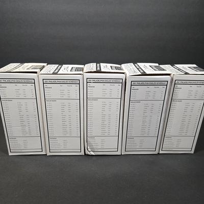 LOT 106Z: NIB Donovan McNabb Bobble Heads/ 5 Home Jerseys, 4 Away