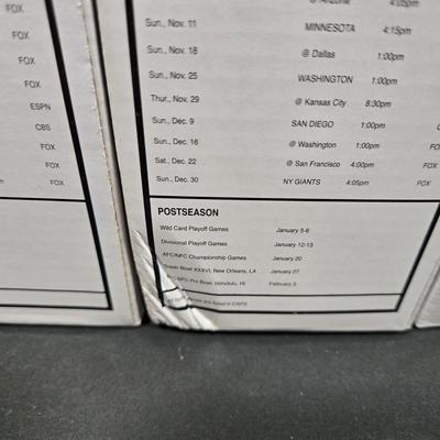 LOT 106Z: NIB Donovan McNabb Bobble Heads/ 5 Home Jerseys, 4 Away