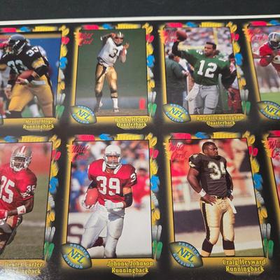 LOT 106Z: Five Fleer 1999 Diamond Skills Commemorative Sheets and Four Premier NFL Edition Uncut Sheets