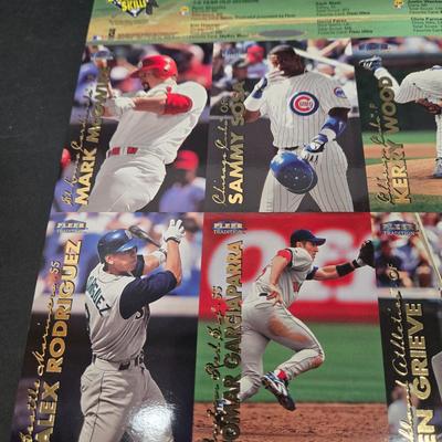 LOT 106Z: Five Fleer 1999 Diamond Skills Commemorative Sheets and Four Premier NFL Edition Uncut Sheets
