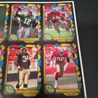 LOT 106Z: Five Fleer 1999 Diamond Skills Commemorative Sheets and Four Premier NFL Edition Uncut Sheets