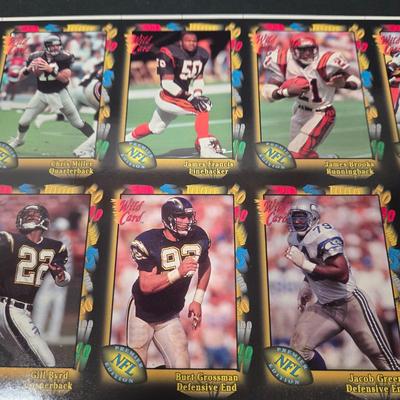 LOT 106Z: Five Fleer 1999 Diamond Skills Commemorative Sheets and Four Premier NFL Edition Uncut Sheets