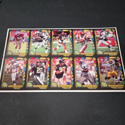 LOT 106Z: Five Fleer 1999 Diamond Skills Commemorative Sheets and Four Premier NFL Edition Uncut Sheets