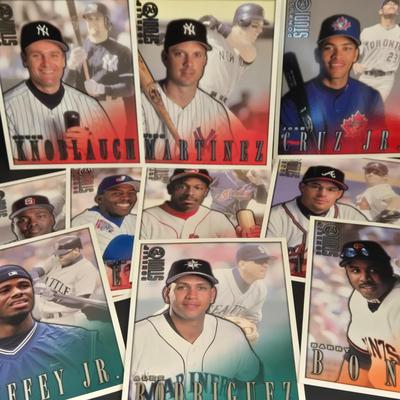 LOT 110Z: Assorted Sports Fan's Collectibles Including Penants, Cards, and More