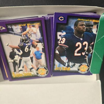 LOT 120Z: Six Boxes Score Supplemental Football Trading Cards/ Many Unopened Packs, Box of Fleer, and Pacific Football Trading Cards
