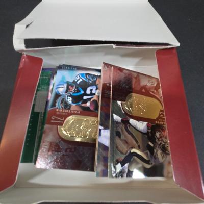 LOT 151Z: Multiple Boxes of Football Trading Cards