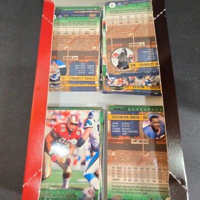 LOT 151Z: Multiple Boxes of Football Trading Cards