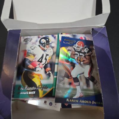 LOT 151Z: Multiple Boxes of Football Trading Cards