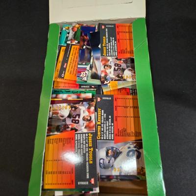 LOT 151Z: Multiple Boxes of Football Trading Cards