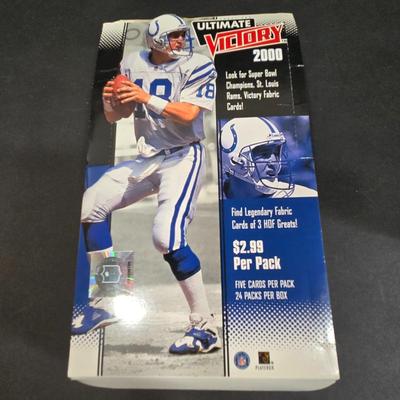 LOT 151Z: Multiple Boxes of Football Trading Cards