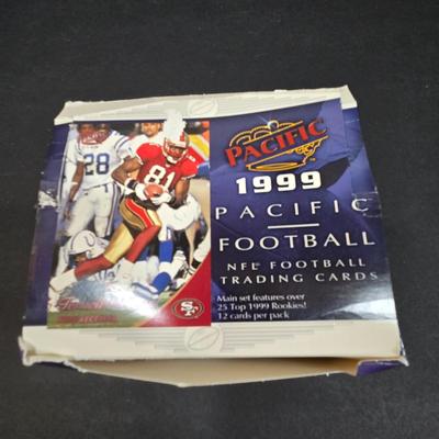 LOT 151Z: Multiple Boxes of Football Trading Cards