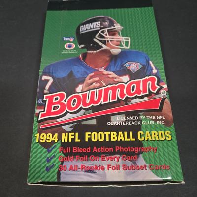 LOT 153Z: Variety of Boxes of Football Trading Cards and Numerous Plastic Holders