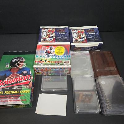 LOT 153Z: Variety of Boxes of Football Trading Cards and Numerous Plastic Holders