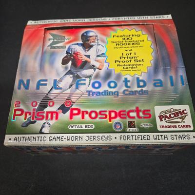 LOT 153Z: Variety of Boxes of Football Trading Cards and Numerous Plastic Holders
