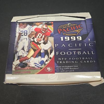 LOT 153Z: Variety of Boxes of Football Trading Cards and Numerous Plastic Holders