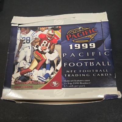 LOT 153Z: Variety of Boxes of Football Trading Cards and Numerous Plastic Holders