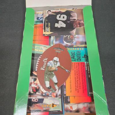 LOT 153Z: Variety of Boxes of Football Trading Cards and Numerous Plastic Holders