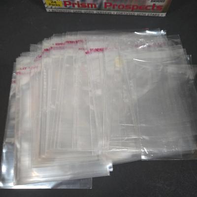 LOT 153Z: Variety of Boxes of Football Trading Cards and Numerous Plastic Holders