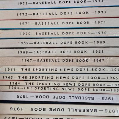 LOT 157Z: Box of Books Including Baseball Dope Books, National Football Guide Books, and More