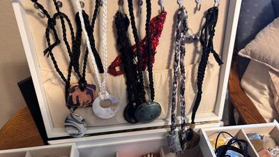 JEWELRY BOX FILLED WITH BRACELETS. EARRINGS AND NECKLACES