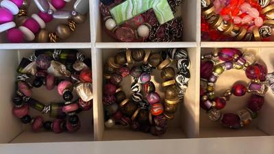 JEWELRY BOX FILLED WITH BRACELETS. EARRINGS AND NECKLACES