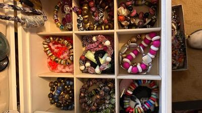 JEWELRY BOX FILLED WITH BRACELETS. EARRINGS AND NECKLACES