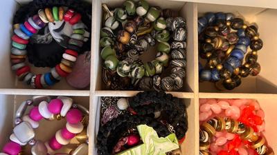 JEWELRY BOX FILLED WITH BRACELETS. EARRINGS AND NECKLACES