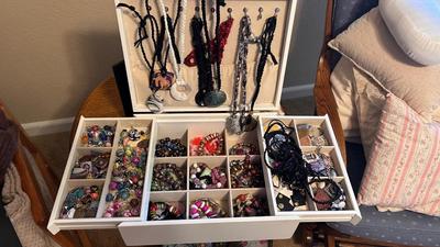 JEWELRY BOX FILLED WITH BRACELETS. EARRINGS AND NECKLACES