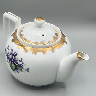 LOT 27: Japanese Ceramic Collection - Teapot, Teabag Strainer and More