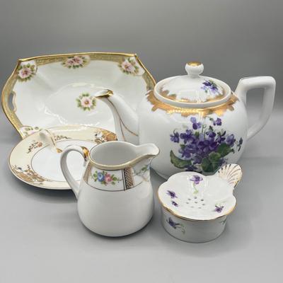 LOT 27: Japanese Ceramic Collection - Teapot, Teabag Strainer and More