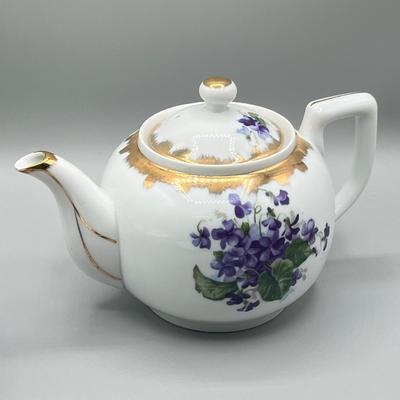 LOT 27: Japanese Ceramic Collection - Teapot, Teabag Strainer and More