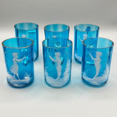 LOT 36: Six Antique Hand-Painted Mary Gregory Blue Glass Mugs