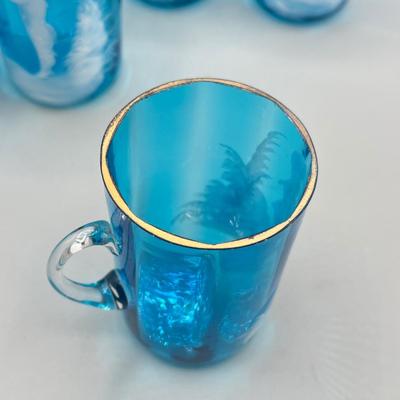 LOT 36: Six Antique Hand-Painted Mary Gregory Blue Glass Mugs