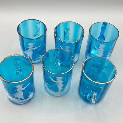 LOT 36: Six Antique Hand-Painted Mary Gregory Blue Glass Mugs