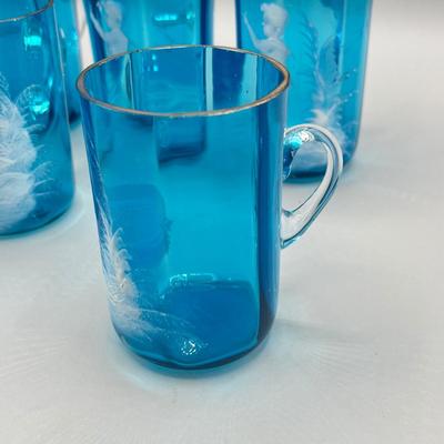 LOT 36: Six Antique Hand-Painted Mary Gregory Blue Glass Mugs