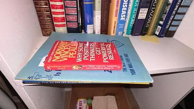 AN ASSORTMENT OF DIFFERENT BOOKS