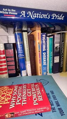 AN ASSORTMENT OF DIFFERENT BOOKS