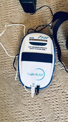 LIGHT RELIEF DEVICE AND LAMP