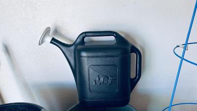 PLANTERS, PAINTED ROCKS, TOMATO CAGE AND SPRINKLER