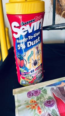 OUTSIDE SEASONAL WELCOME FLAGS, PICNIC BASKET, PESTICIDES, WALL PLANTER, AND WIND CHIME