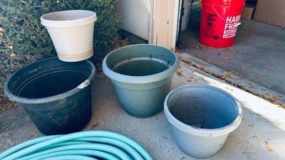 GARDEN HOSE, PLANTERS, AND POTTING SOIL