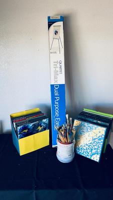 ART EASEL, PAINT BRUSHES GALORE, AND CANVASES FOR REPURPOSING OR HANGING ON YOUR WALL