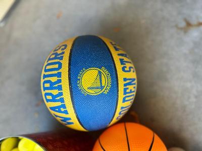 A BUCKET AND A BOX OF BALLS