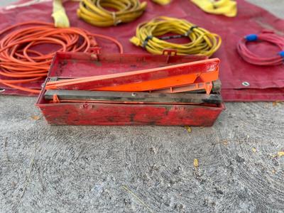 50” TREE SPAD COVER, A TREE BALL TOTE LIFTER AND EXTENSION CORDS