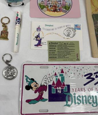 Sale Photo Thumbnail #148: Collectible lot includes newspaper handout, pin-on button, license plate, key fobs, pen, number sticker, and more. See photos for what's included.