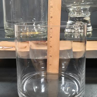 LOT 346B: Block Crystal Pedestal Bowl, Tall Glass Cylinder Vase, Smaller Glass Cylinder Bowl, and Mirror Display Shelf