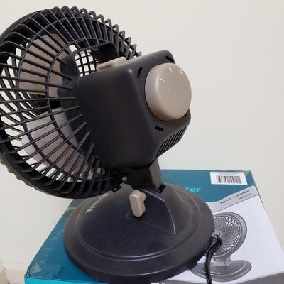 LOT 411Z: New Sealed Homedics Humidifier & Holmes Oscillating Power Fan