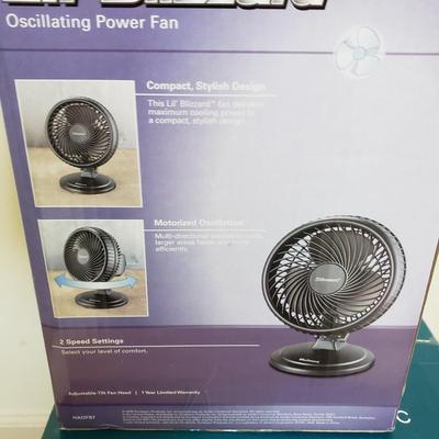 LOT 411Z: New Sealed Homedics Humidifier & Holmes Oscillating Power Fan