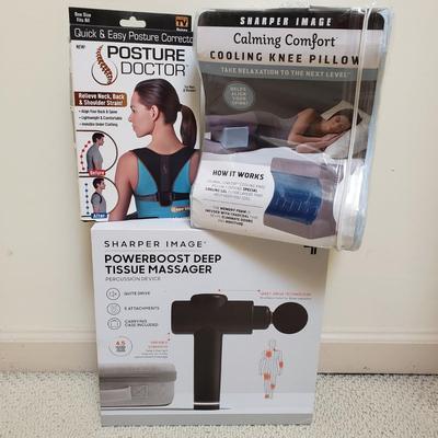 LOT 414Z: New in Box Sharper Image Deep Tissue Massager, Knee Pillow & Posture Doctor